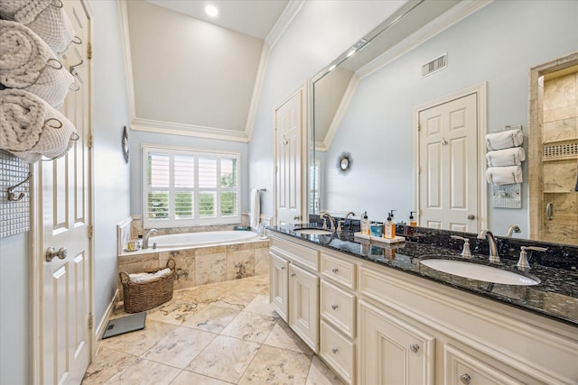 bathroom with a sink, ornamental molding, a bath, and visible vents