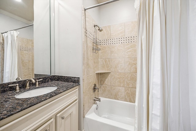 bathroom with crown molding, vanity, and shower / bath combo with shower curtain