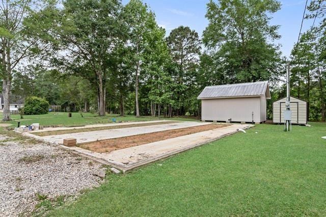 exterior space with an outbuilding and a shed