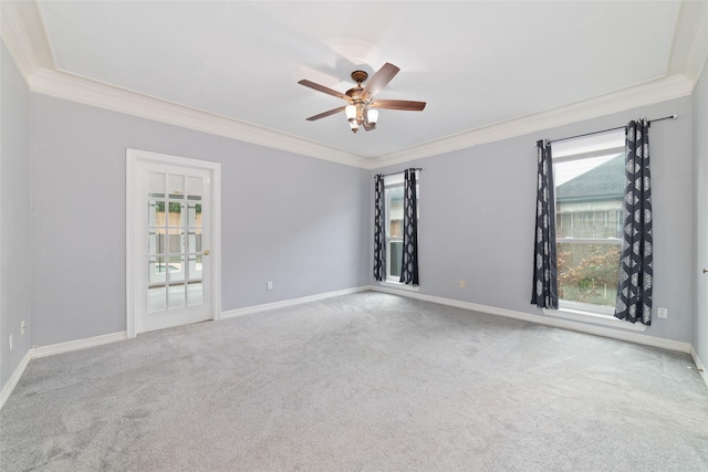 13414 Autumn Valley Dr, Cypress, TX 77429 - spare room featuring crown molding, carpet floors, ceiling fan, and baseboards