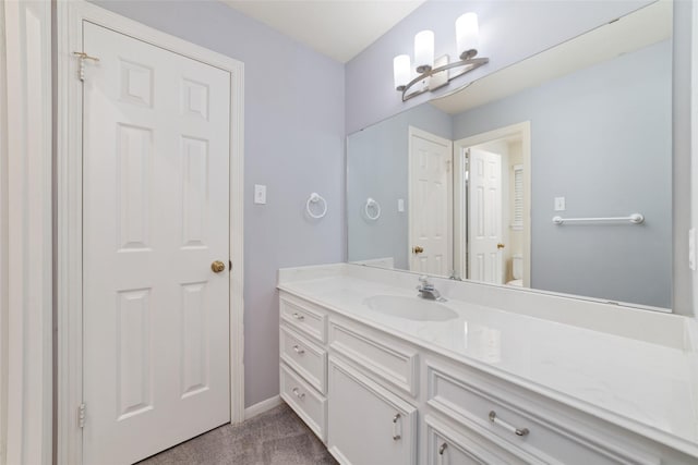 13414 Autumn Valley Dr, Cypress, TX 77429 - bathroom with vanity, toilet, and baseboards