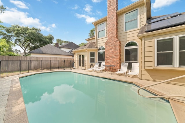 13414 Autumn Valley Dr, Cypress, TX 77429 - view of swimming pool featuring french doors, fence, and a patio