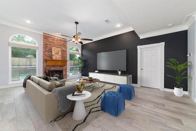 13414 Autumn Valley Dr, Cypress, TX 77429 - living room with ornamental molding, plenty of natural light, baseboards, a ceiling fan, and a fireplace