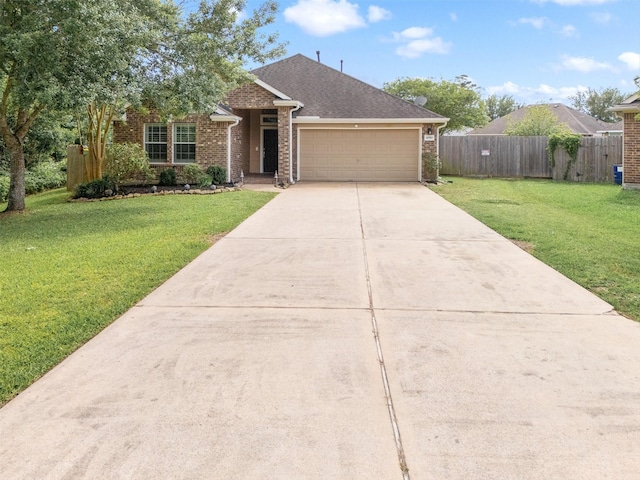 ranch-style house featuring fence, driveway, a front lawn, and a garage