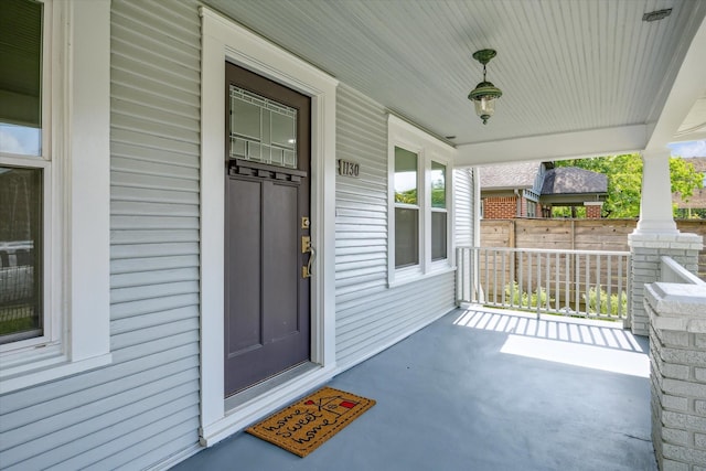 entrance to property with a porch