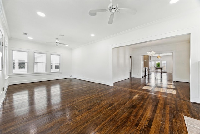 unfurnished living room with visible vents, ornamental molding, ceiling fan with notable chandelier, and hardwood / wood-style floors