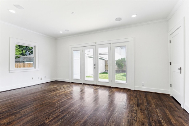 spare room with crown molding, recessed lighting, baseboards, and dark wood-type flooring