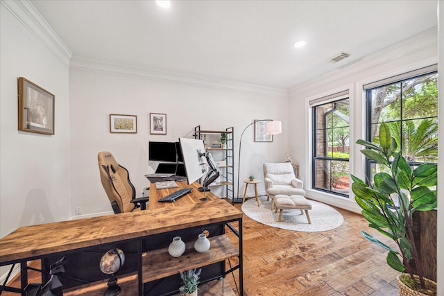 office area with wood finished floors, crown molding, visible vents, baseboards, and recessed lighting
