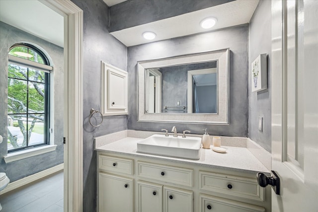 3410 Creekstone Dr, Sugar Land, TX 77479 - bathroom with baseboards, vanity, and toilet