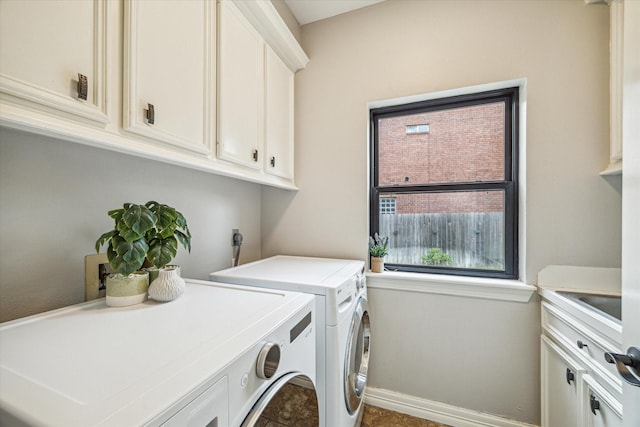 3410 Creekstone Dr, Sugar Land, TX 77479 - washroom with washer and dryer, cabinet space, and baseboards