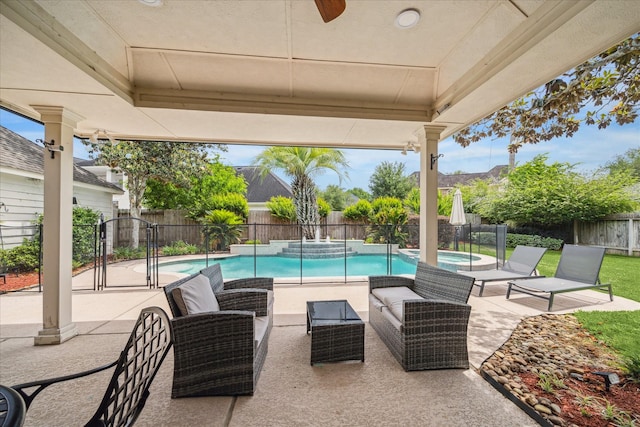 3410 Creekstone Dr, Sugar Land, TX 77479 - view of swimming pool featuring a fenced backyard, a patio area, a pool with connected hot tub, and a ceiling fan