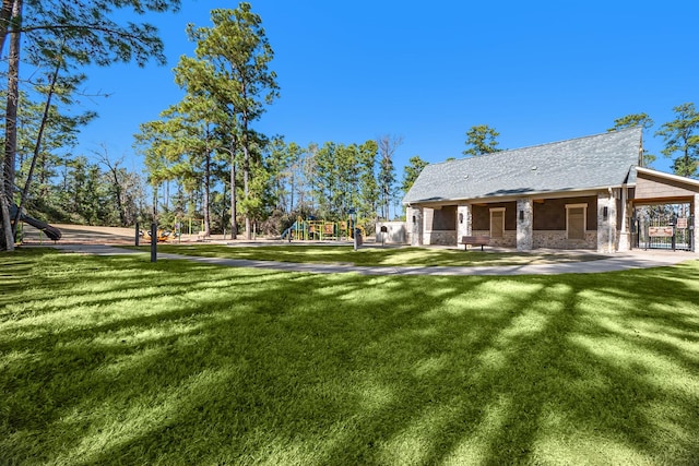 13716 Rising Sun Ln, Conroe, TX 77384 - view of yard featuring a playground
