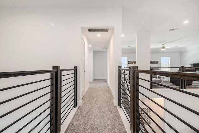 13716 Rising Sun Ln, Conroe, TX 77384 - hallway with attic access, light carpet, an upstairs landing, and recessed lighting