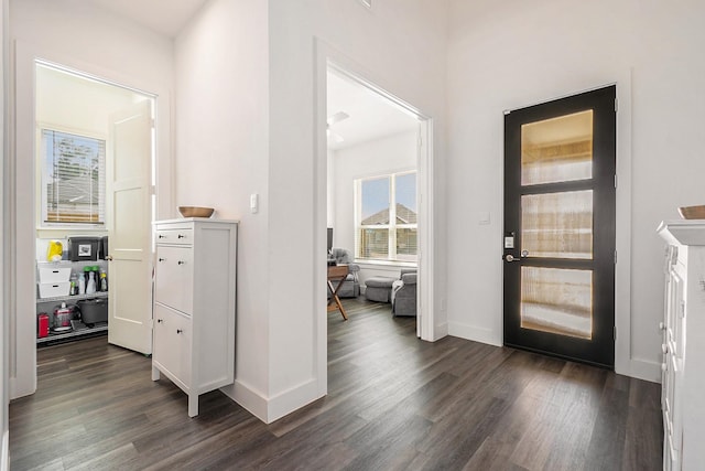 13716 Rising Sun Ln, Conroe, TX 77384 - entrance foyer with dark wood-type flooring and baseboards