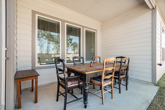 13716 Rising Sun Ln, Conroe, TX 77384 - view of patio / terrace featuring outdoor dining space