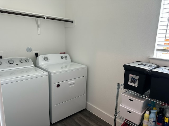 13716 Rising Sun Ln, Conroe, TX 77384 - washroom with washer and clothes dryer and dark wood-style flooring