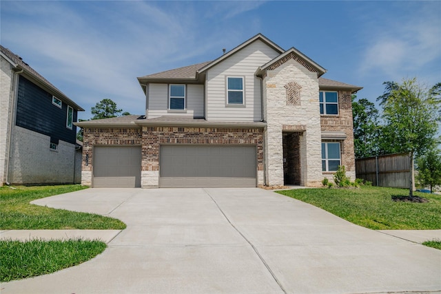 13716 Rising Sun Ln, Conroe, TX 77384 - view of front of property with driveway, stone siding, an attached garage, and a shingled roof