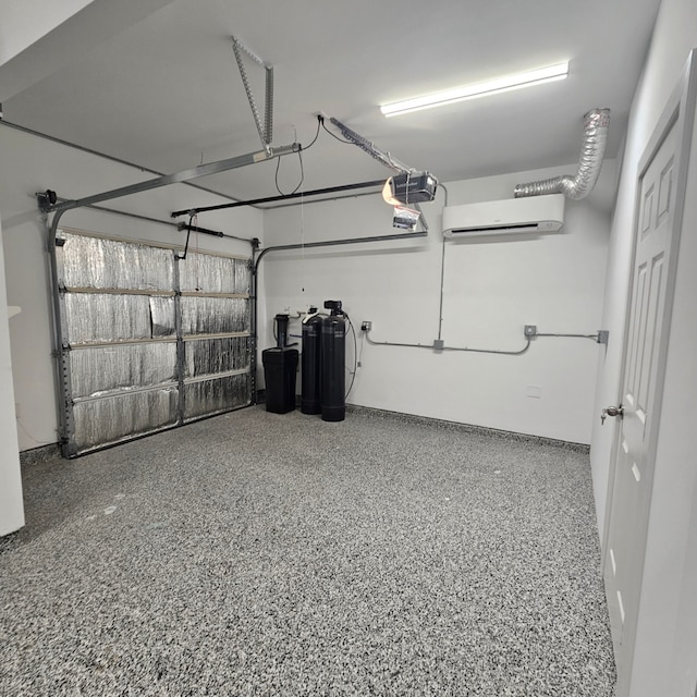 12341 N Chestnut Hills Dr, Conroe, TX 77303 - garage featuring a wall mounted air conditioner and a garage door opener