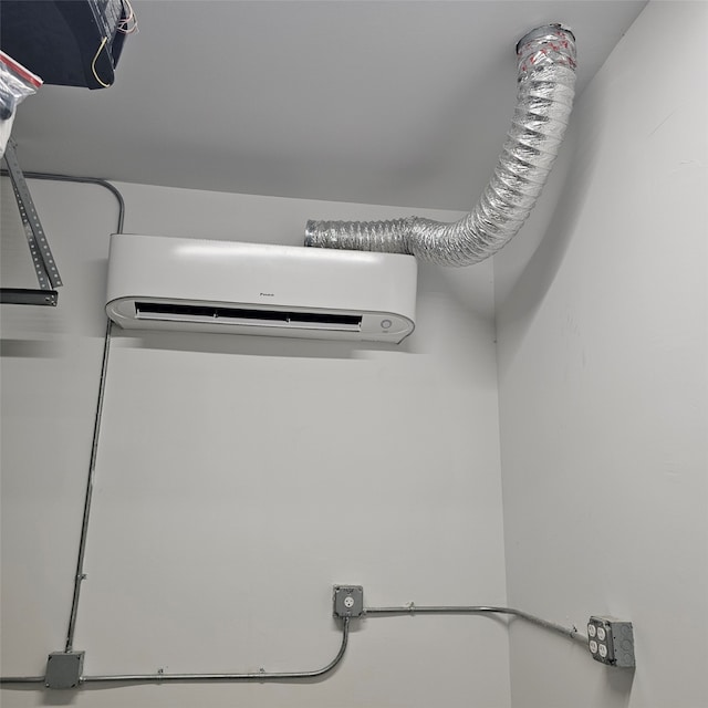 12341 N Chestnut Hills Dr, Conroe, TX 77303 - garage view of a wall mounted air conditioner
