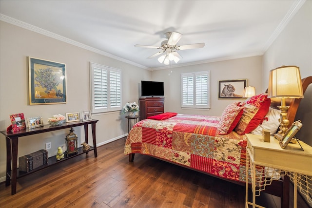 bedroom with crown molding, baseboards, ceiling fan, and hardwood / wood-style flooring