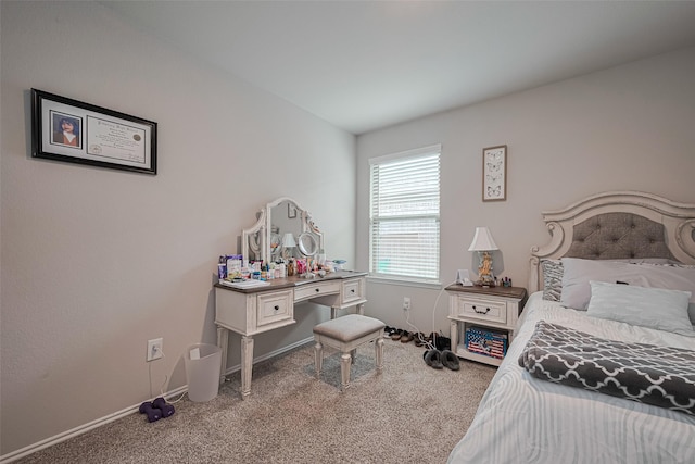 3923 Hawaiian Ct, Baytown, TX 77521 - carpeted bedroom with an office area and baseboards