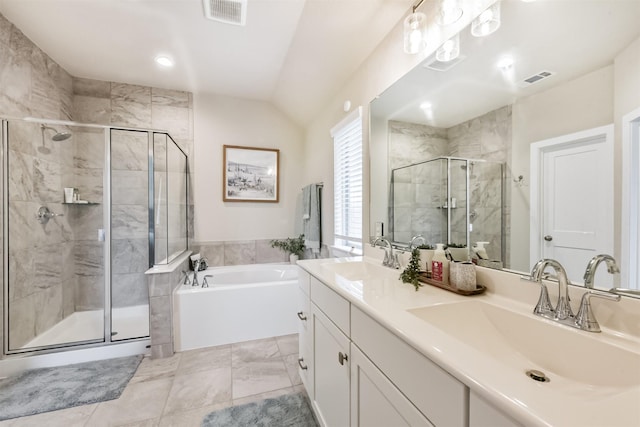 4711 Bartagrass Dr, Rosenberg, TX 77469 - full bathroom featuring a bath, visible vents, vaulted ceiling, a shower stall, and a sink