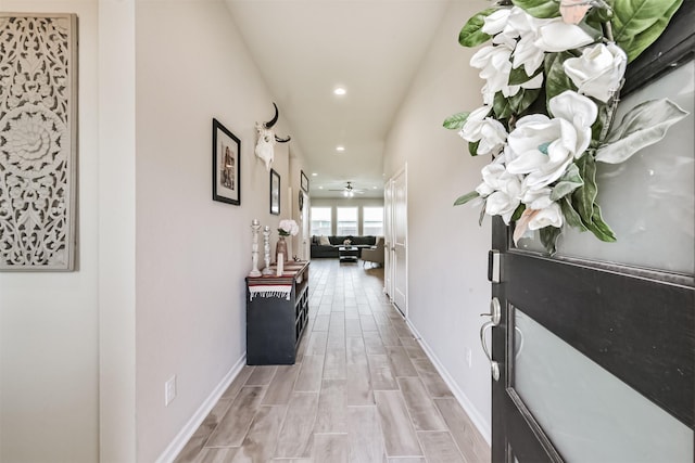 4711 Bartagrass Dr, Rosenberg, TX 77469 - corridor with baseboards, light wood-type flooring, and recessed lighting