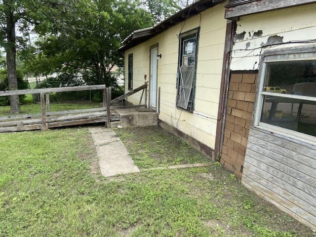 view of property exterior featuring a yard