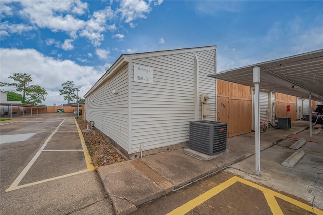 exterior space with cooling unit