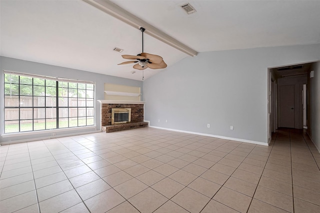 unfurnished living room with visible vents, a brick fireplace, light tile patterned flooring, ceiling fan, and lofted ceiling with beams