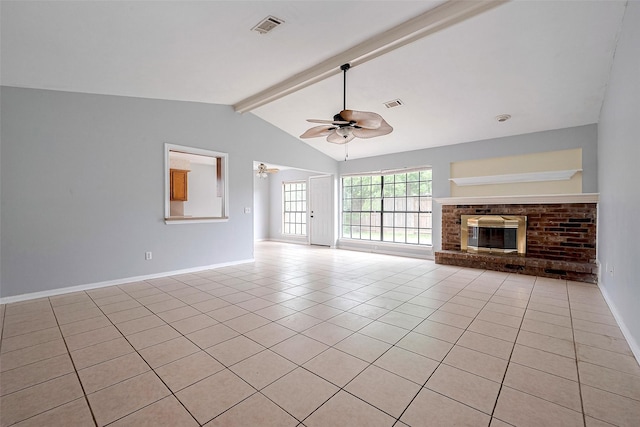 unfurnished living room featuring ceiling fan, visible vents, a fireplace, light tile patterned floors, and vaulted ceiling with beams