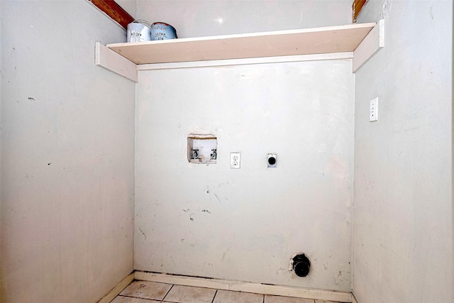 clothes washing area with washer hookup, hookup for an electric dryer, laundry area, and light tile patterned flooring