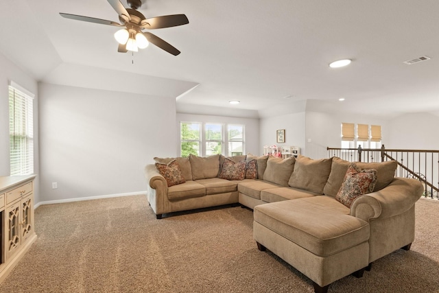 living room featuring visible vents, recessed lighting, ceiling fan, and light carpet