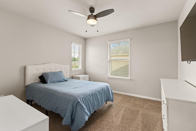 bedroom with baseboards, a ceiling fan, and carpet flooring