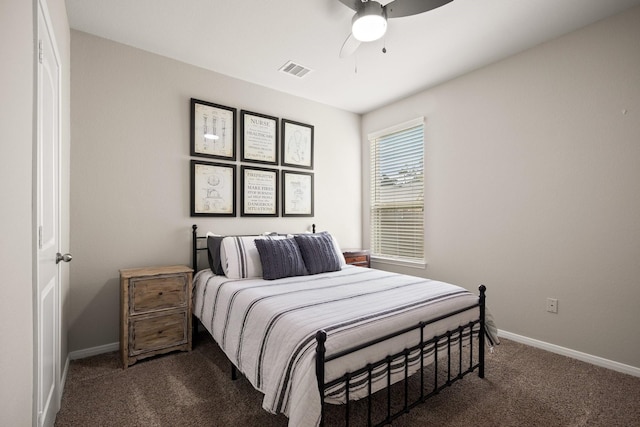 bedroom with baseboards, a ceiling fan, dark colored carpet, and visible vents
