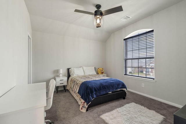 bedroom featuring visible vents, carpet flooring, baseboards, and ceiling fan