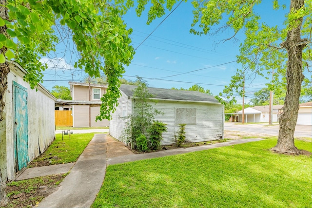 202 10th Ave N, Texas City, TX 77590 - exterior space with fence and an outbuilding