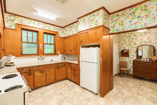 202 10th Ave N, Texas City, TX 77590 - kitchen featuring light floors, ornamental molding, wallpapered walls, and white appliances