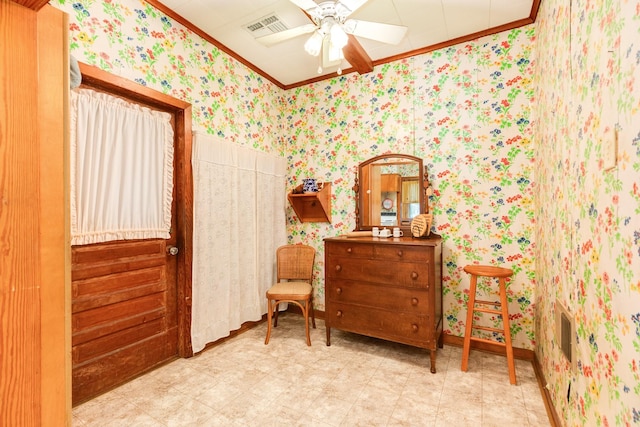 202 10th Ave N, Texas City, TX 77590 - sitting room with a ceiling fan, tile patterned floors, ornamental molding, and wallpapered walls