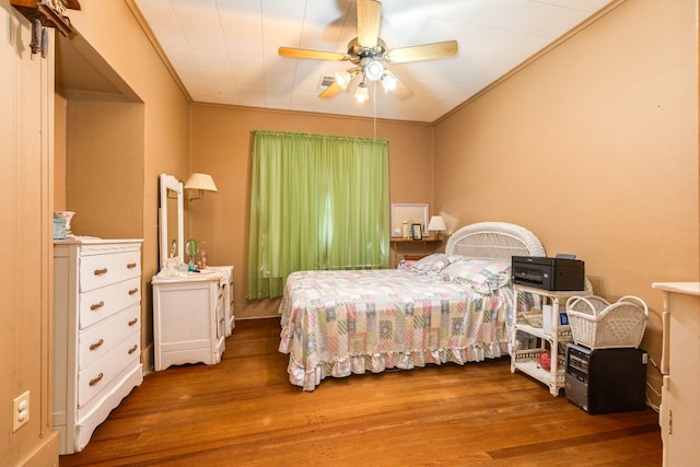 202 10th Ave N, Texas City, TX 77590 - bedroom featuring crown molding, ceiling fan, and wood finished floors