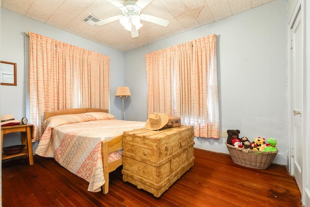 202 10th Ave N, Texas City, TX 77590 - bedroom with ceiling fan, hardwood / wood-style floors, and visible vents