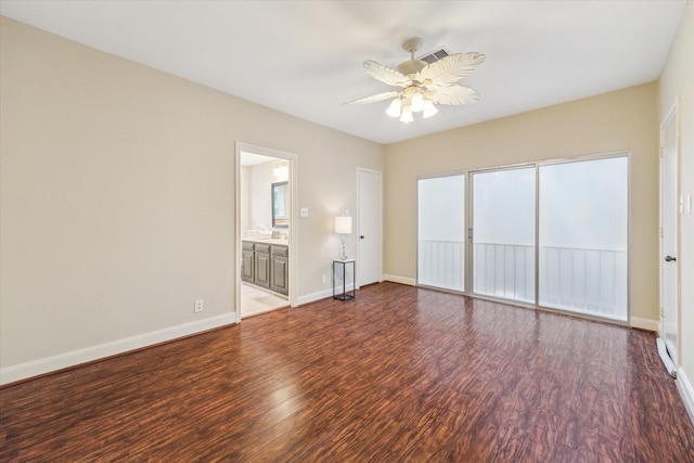 7924 Woodway Dr, Houston, TX 77063 - unfurnished room featuring visible vents, wood finished floors, baseboards, a ceiling fan, and a wealth of natural light