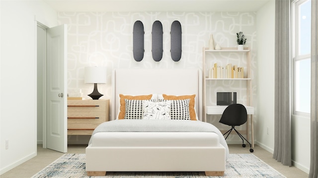 bedroom featuring baseboards and carpet floors