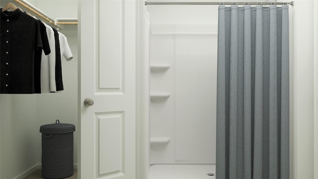 full bath featuring a stall shower