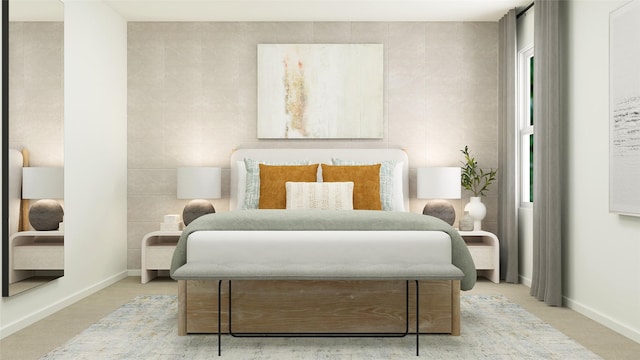 bedroom featuring baseboards, light carpet, and tile walls