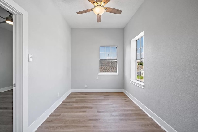 805 10th St, Galveston, TX 77550 - empty room with baseboards, a ceiling fan, and wood finished floors