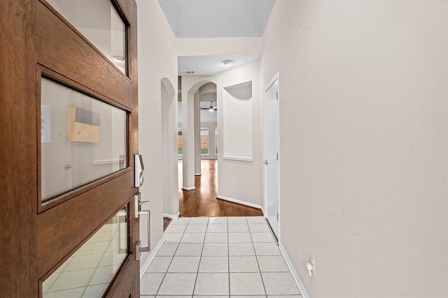 1635 Ashton Village Dr, Spring, TX 77386 - hall featuring arched walkways and baseboards