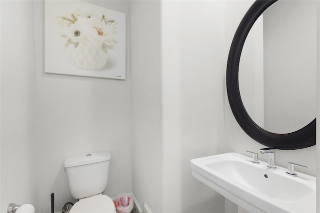 6113 Nicholas Grove Pl, Houston, TX 77055 - bathroom with a sink and toilet