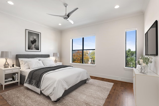 bedroom with ornamental molding, baseboards, recessed lighting, a ceiling fan, and dark wood finished floors