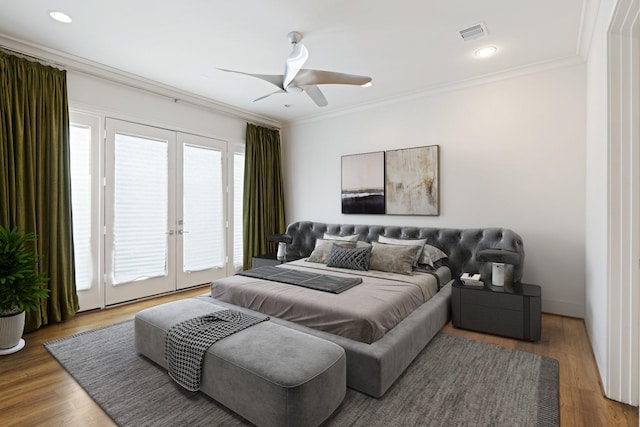 6011 Burgoyne Rd Unit A, Houston, TX 77057 - bedroom with access to exterior, french doors, crown molding, wood finished floors, and ceiling fan